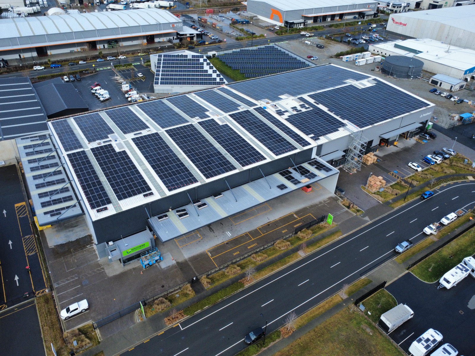 Aerial view of a Generations Energy rooftop solar array on a New Zealand distribution centre